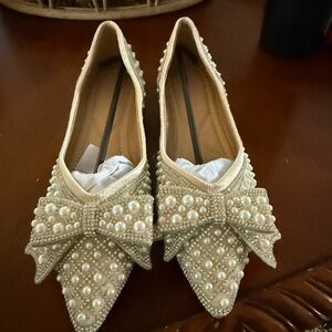 Elegant Pearl Embellished Cream Flats